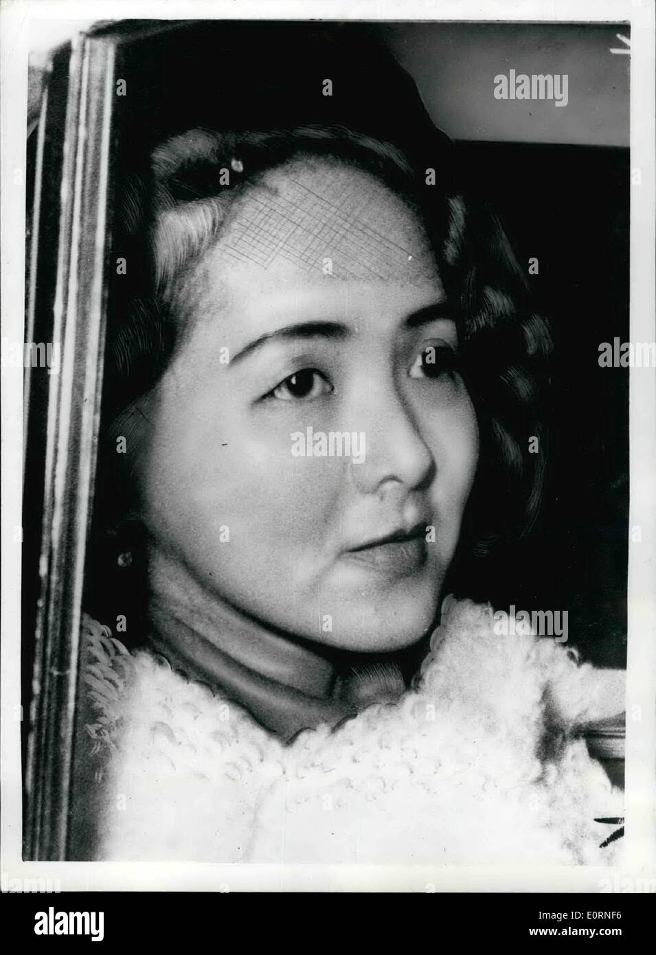 Feb. 02, 1960 - THE FIRST SEA LORD GOES TO COURT TO PLEAD FOR DAUGHTER OF FORMER VIET NAM PREMIER The First Sea Lord, ADMIRAL SIR CHARLES LAMB, went into the witness box yesterday and spoke in the defense of a beautiful Oriental girl accused of a -custom's offence. The girl, LYSETTE VAN-TAM, is the daughter of a former Viet Nam Premier. Sir Charles said he and his wife had acted as Lysette's parents and guardians in this oountry - .although not in a legal Bence. - after Lysette and her father had escaped from the Communists Stock Photo