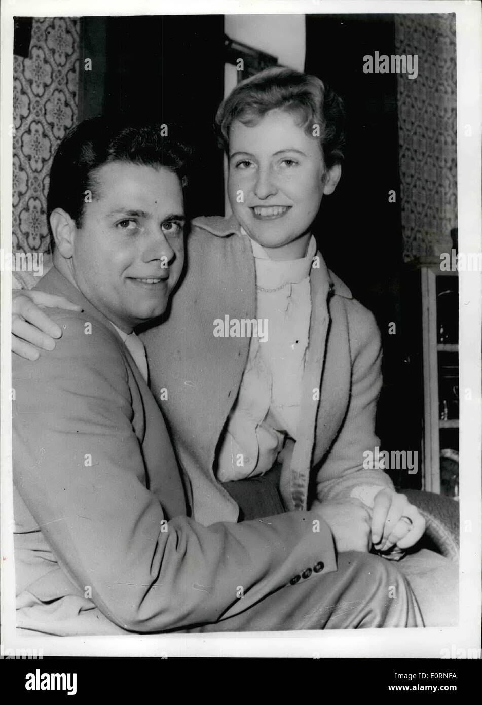 Feb. 02, 1960 - Handsome American gives up everything to marry a girl he had never seen: Twenty six year old Gil Sousa of Bad Axe, near Detroit, Michigan has given up his home a ,000 a year job - to come to Europe to marry a girl he had never seen. The girl is lovely Rosemary Weirich a 20 year old typist of Bemen, Germany. He fell in love with a photograph of Rosemary, given him by a friend. They corresponded for six months and after 150 letters has passed between these he decided to come to Europe - for his Rosemary Stock Photo