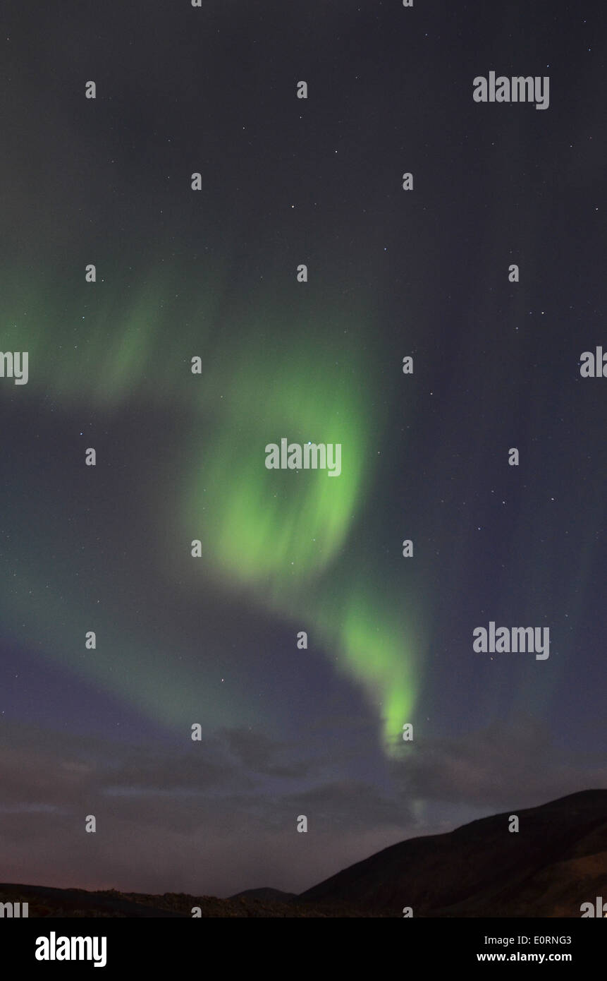 Aurora Borealis or Northern Lights above the Northern Lights Inn, near Grindavik, iceland Stock Photo
