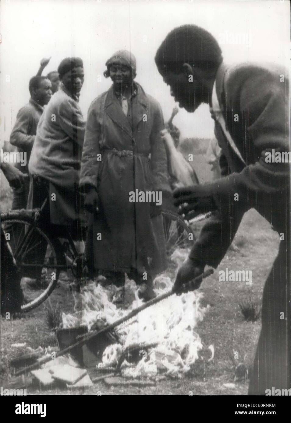 Mar. 28, 1960 - Natives Burn Their Pass Books.: Africans today made a bonfire of their pass books as they marked a day of mourning for the 71 victims of last Monday's police shootings. The burning from the recent announcement of the suspension of the ''Pass'' Law. Photo shows The scene as native burned their pass-books in Orlando today - after the recent auspension of the ''Pass'' Law. Stock Photo