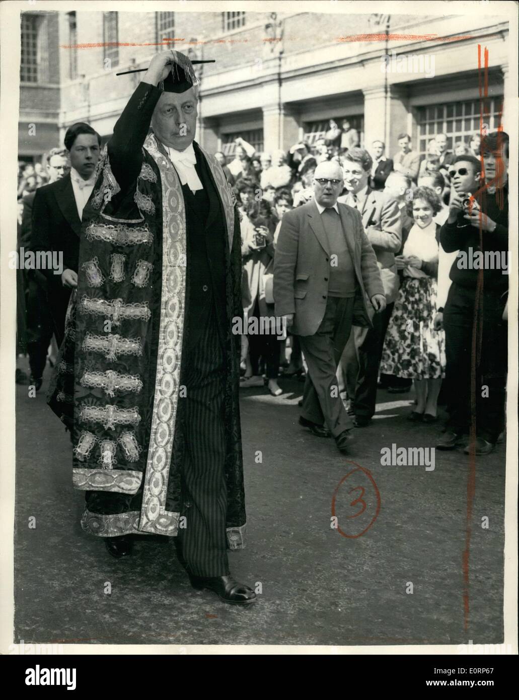 Apr. 04, 1960 - Prime Minister Installed as Chancellor of Oxford university.: The Prime Minister, mr. Harold Macmillan, was today installed as Chancellor of Oxford University, in a ceremony at the Sheldonian Theatre. Photo shows Mr. harold Macmillan, waering his robes - pistured at Oxford University today, where he was installed as Chancellor. Hs page is his 16-year old grandson, Alexander Macmillan, an Eton Schoolboy. Stock Photo