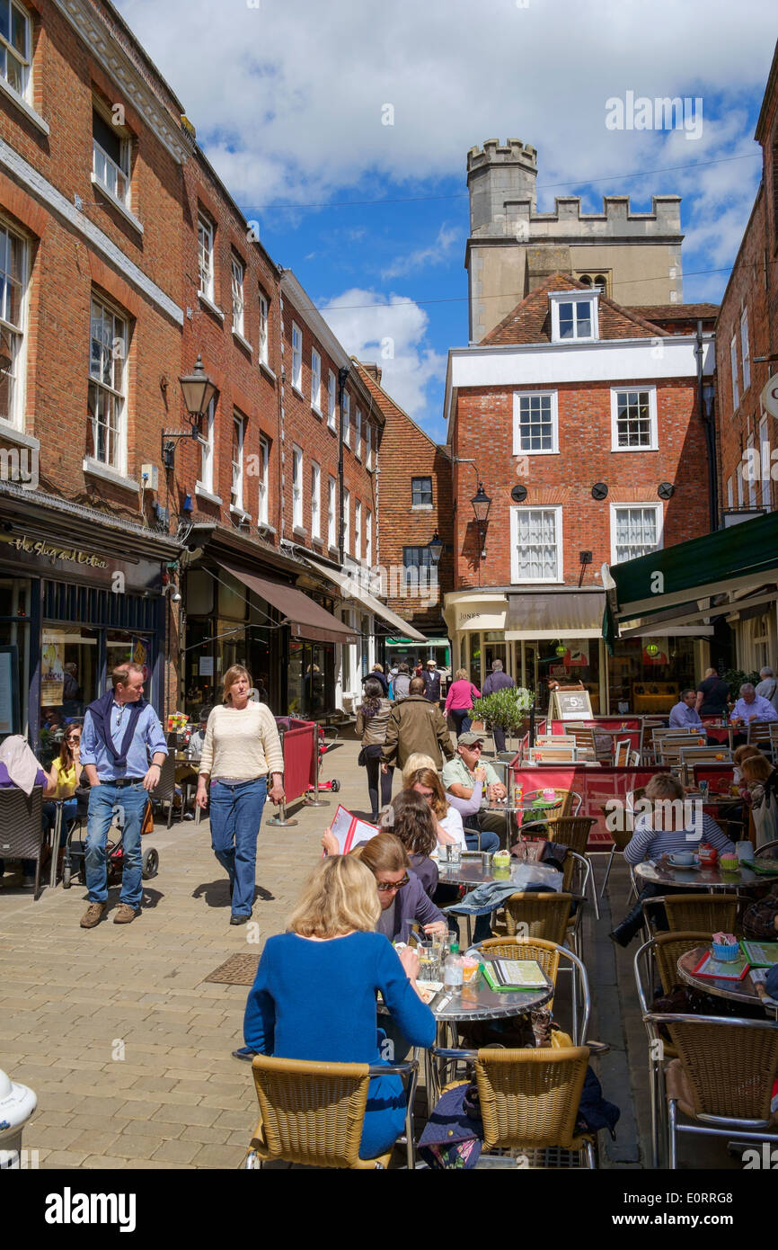 People outside cafes in Winchester, Hampshire, England, Uk Stock Photo