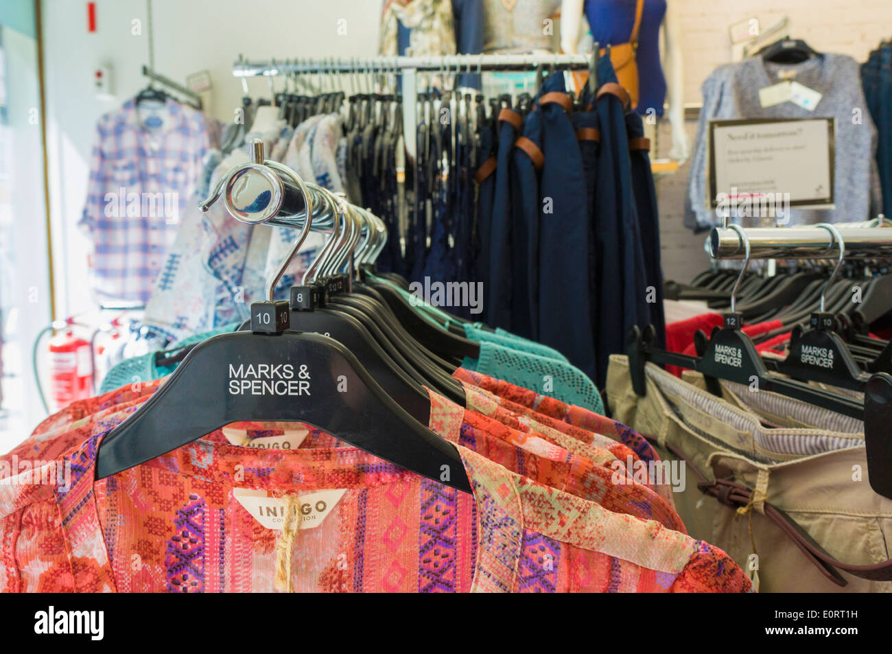 Marks and Spencer store - Inside the clothing section in a large city centre Marks and Spencer - M&S shop, UK Stock Photo