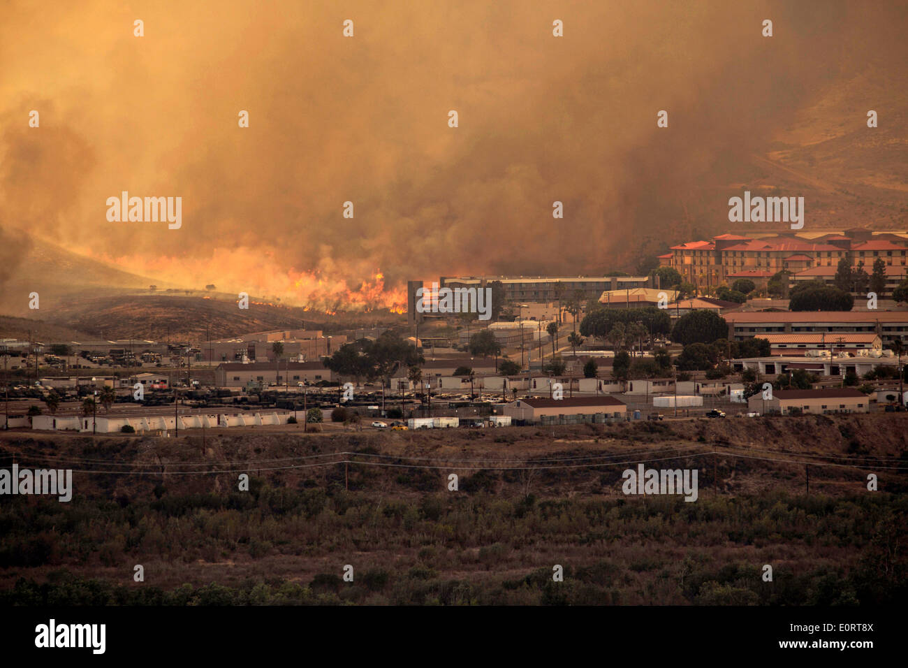 The Las Pulgas wildfire as it burns along a complex in the foothills around the Marine Corps Air Station May 16, 2014 in Camp Pendleton, California. Stock Photo
