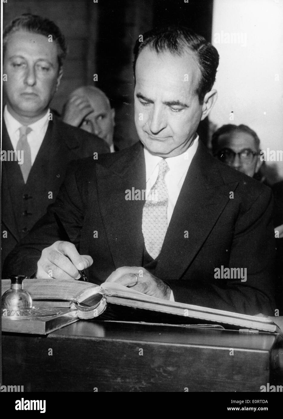 Jose Figueres Ferrer signing a book Stock Photo