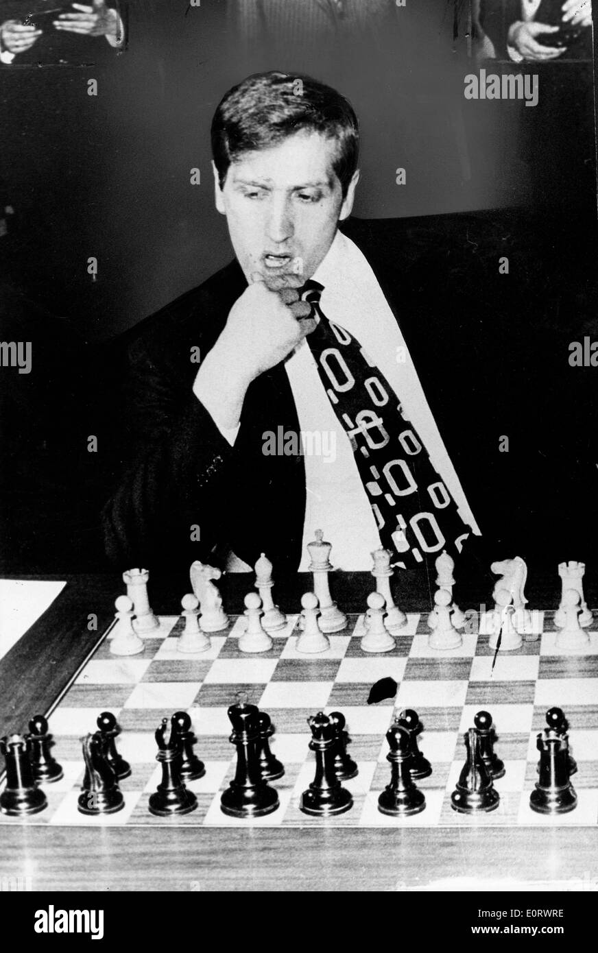 Bobby Fischer at Chess Board with Newspaper Bobby the Champ