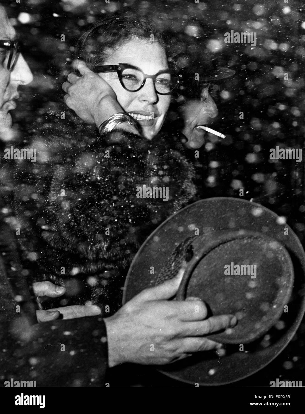 Actress Ava Gardner standing in the snow Stock Photo