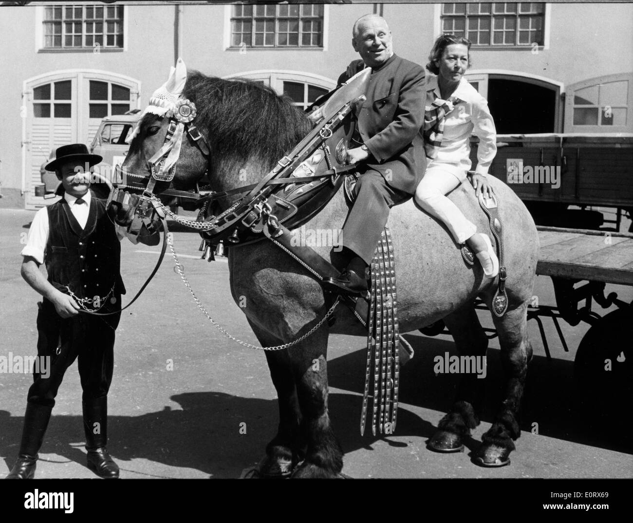 Actor Gert Frobe riding a horse Stock Photo