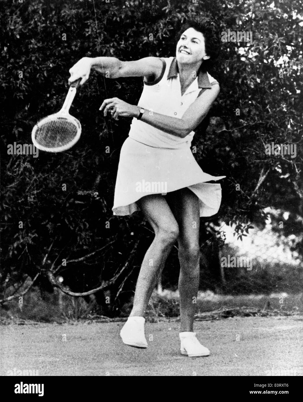 Tamie Fraser plays tennis against husband Stock Photo