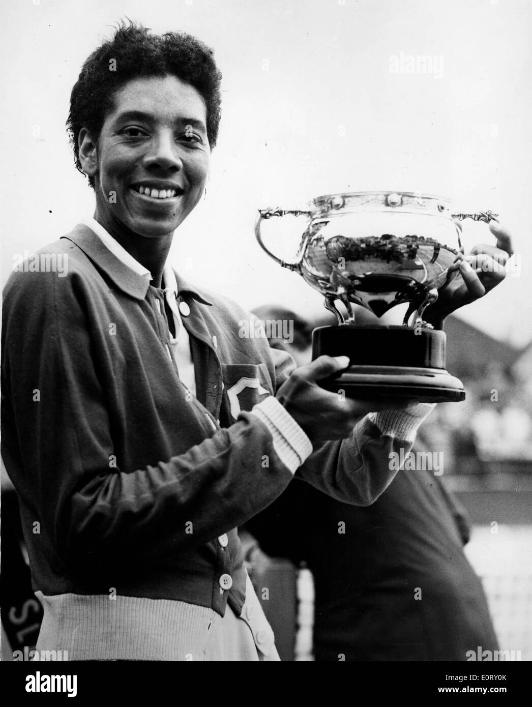 Standing fame smiling holding trophy hires stock photography and