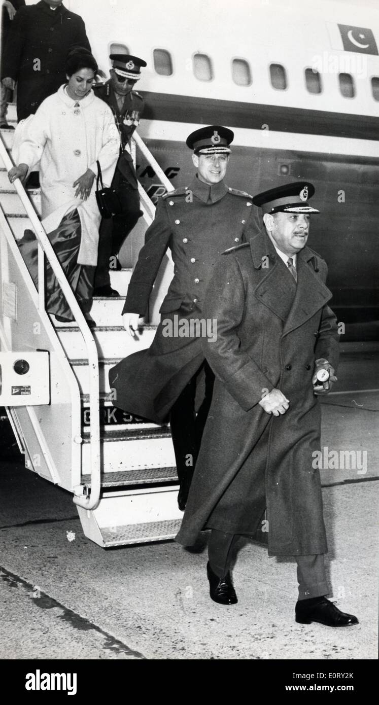Pakistan President Ayub Khan exits an airplane. Stock Photo