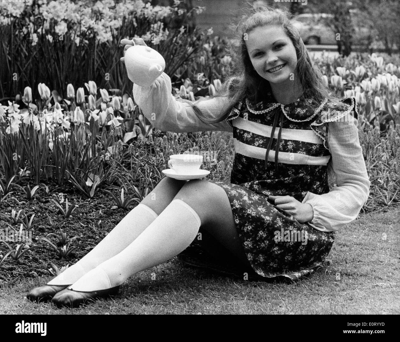 Actress Fiona Fullerton having tea in the garden Stock Photo