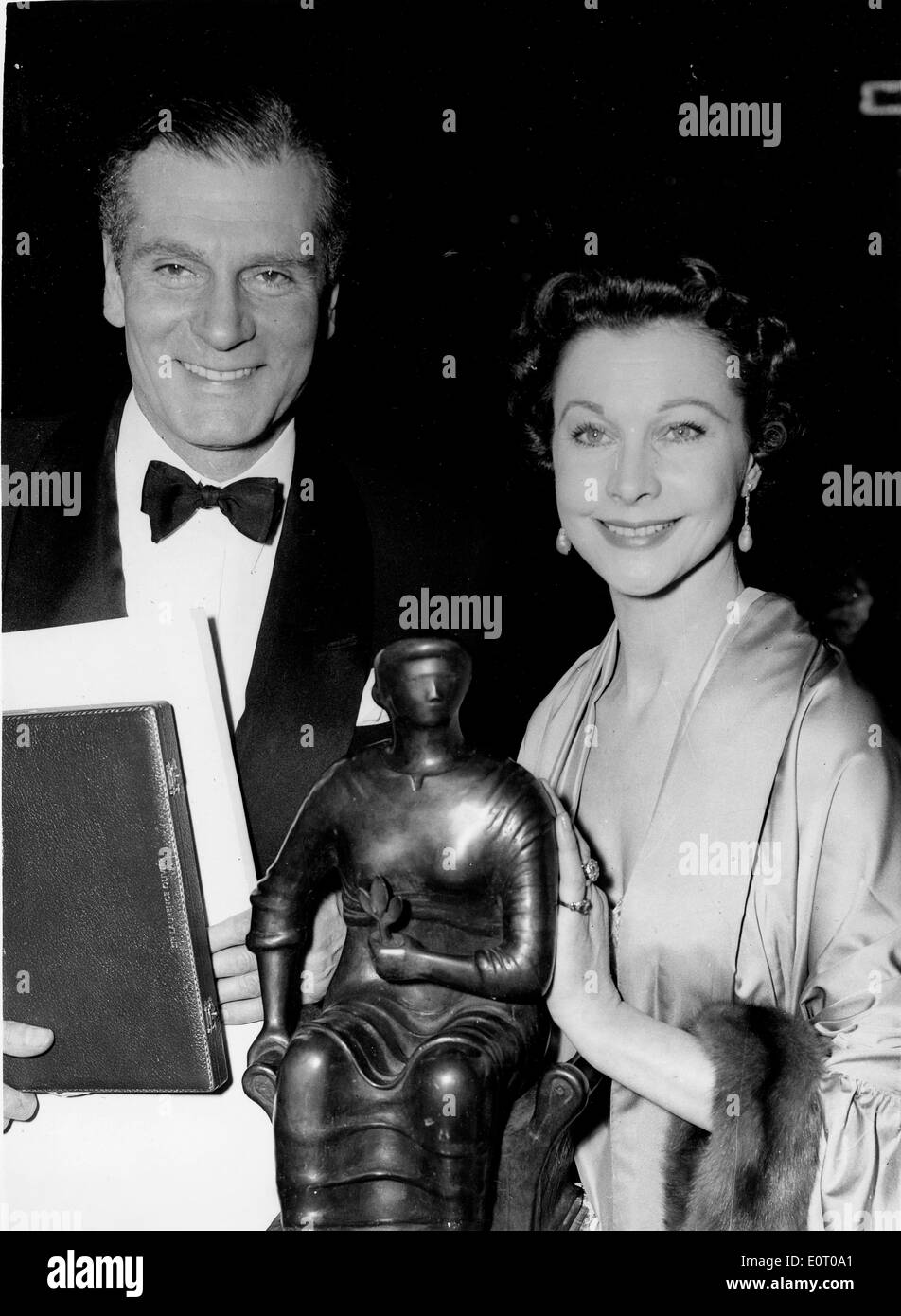 Actor Laurence Olivier receiving an award from his wife Vivien Leigh Stock Photo