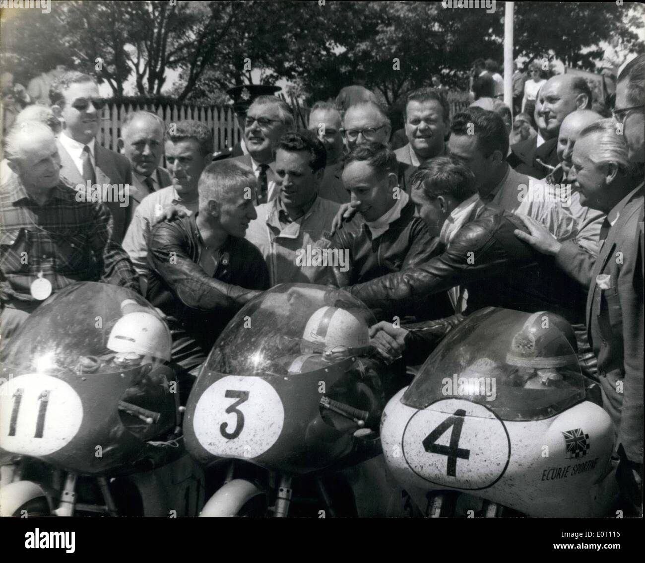 Jun. 06, 1960 - John Surtees wins Senior T.T. On the Isle of Man - Smashes all race records.: John Sureees won the Senior T.T. on his four cylinder M.V. Augusta - on the Isle of Man - smashing all race records - with the fantastic speed of 102.44 m.p.h.. He has now won the race four times - equaling the record of Stanley Woods of pre war years. He is the first man to win the race three times in succession. he never lapped at less than 100 m.p.h Stock Photo