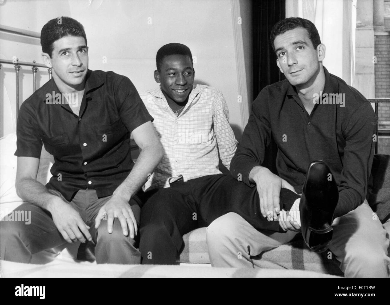 Soccer player Pele with friends Stock Photo
