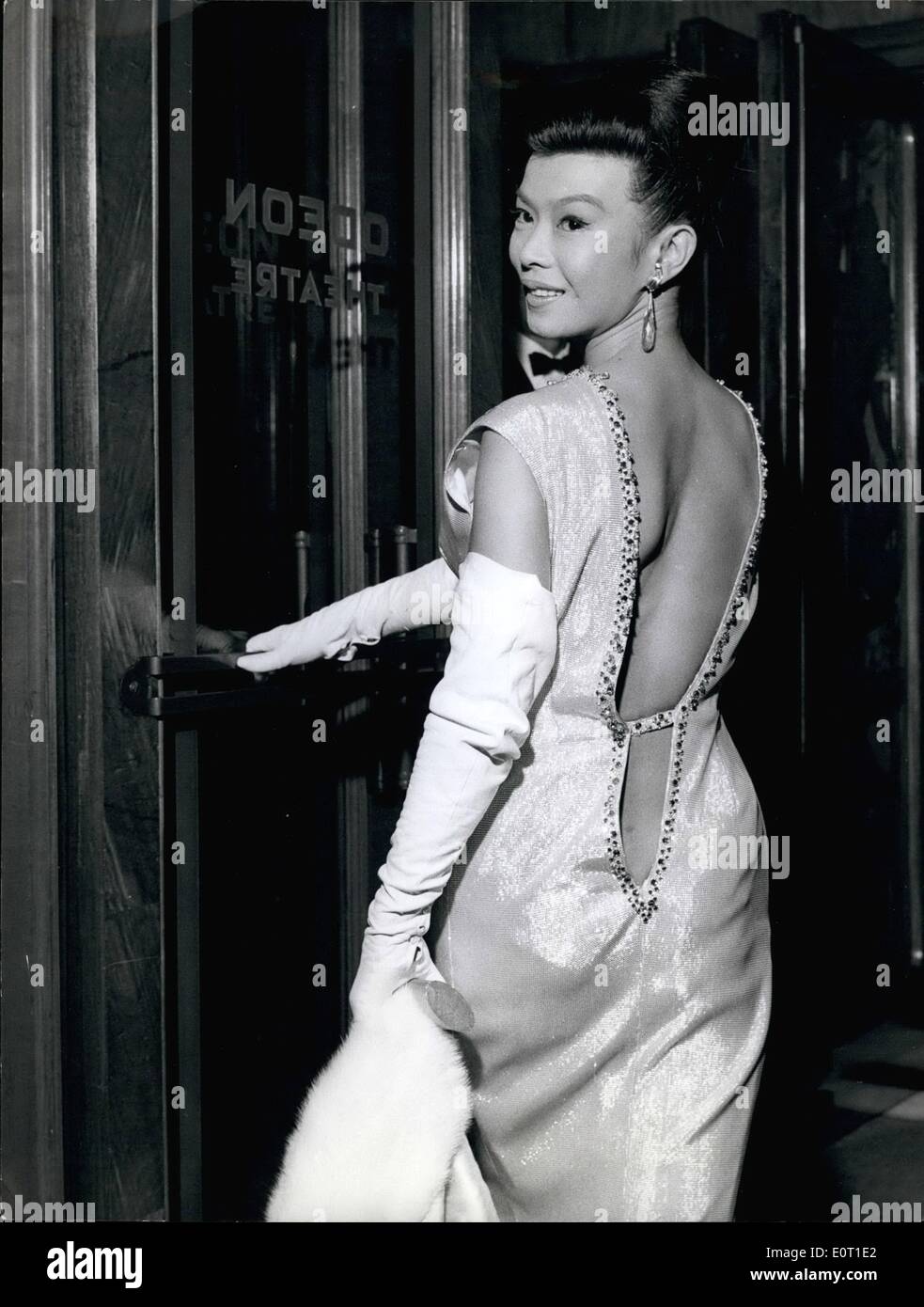 Jun. 24, 1960 - 24-6-60 Deep backed fashion at Premiere. The premiere took place last night at the Odeon, Leicester Square, of the film The Savage Innocents . Photo Shows: Miss Yoko Tani, star of the film, wore this very deep-backed dress, when she arrived for last night's premiere. Stock Photo