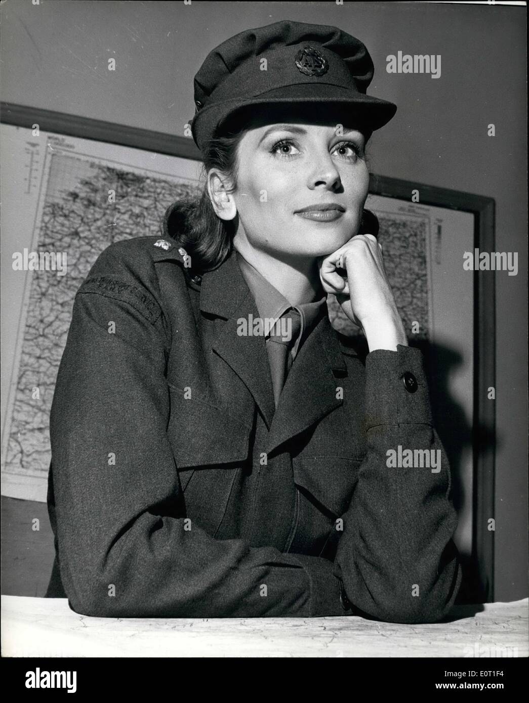 Jun. 29, 1960 - 29-6-60 Suzy Parker as A.T.S. Officer for film. American screen star, Suzy Parker is now filming in Destruction Test at Walton on Thames Studios. Suzy, who plays opposite character actor Harry Andrews, takes on the role of a Lieutenant in the A.T.S. The film is based on the book A Small Back Room in Marylebone by Alec Waugh. Photo Shows: Suzy Parker in her A.T.S. uniform on the set yesterday. Stock Photo