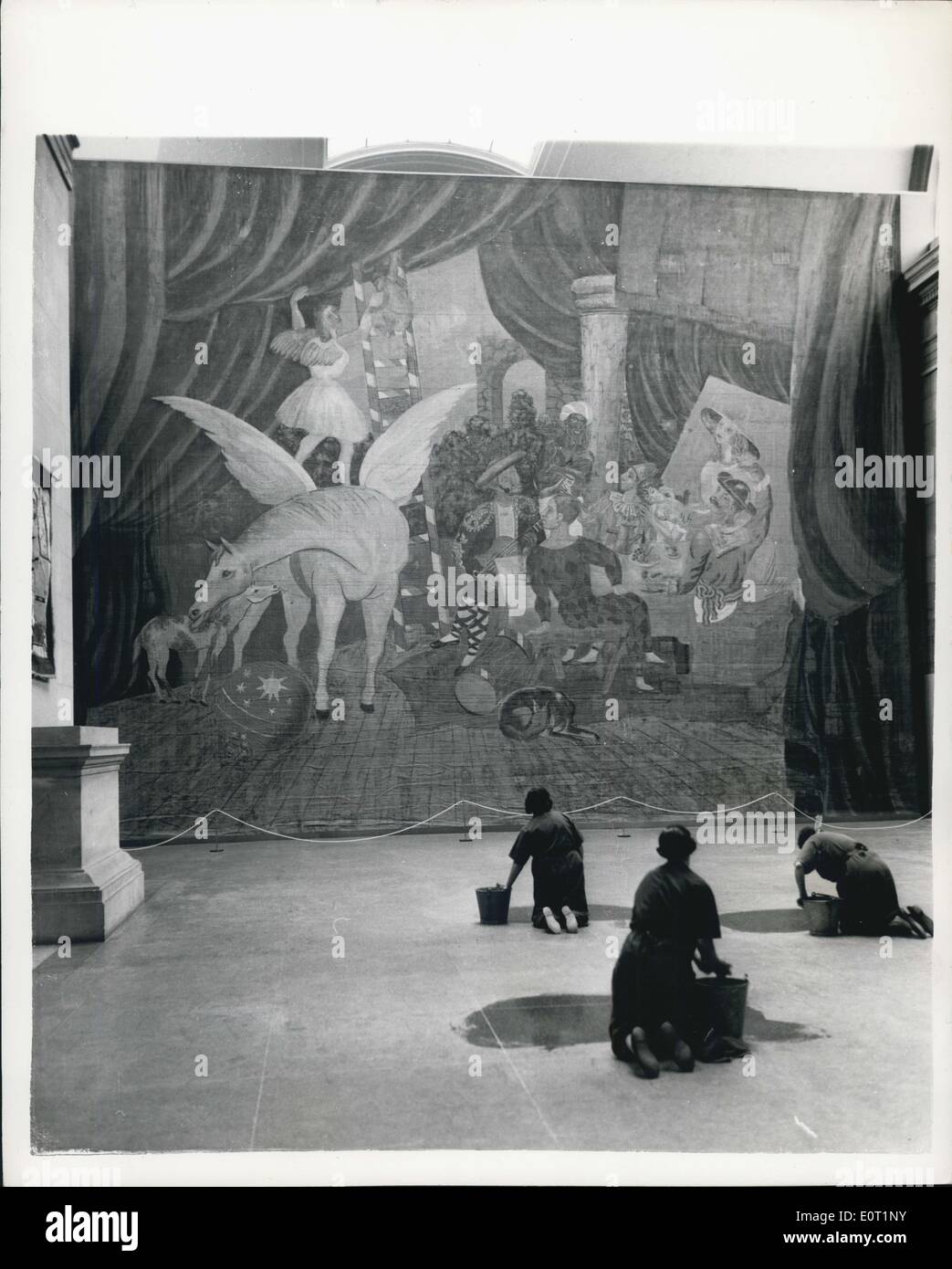 Jul. 05, 1960 - Exhibition of Works of Picasso - in London. Charladies look at ''Parade'' 32ft. x 54 ft. An exhibition of the works of Picasso from all parts of the world - and valued at something like ?10.000.000 is being held at the Tate Gallery, London. Photo shows Three charladies pause in their work - to look at ''Parade'' - the largest Picasso - which measures 32 ft. by 54 ft. It is a backcloth for a ballet painted in Rome in 1917 Stock Photo