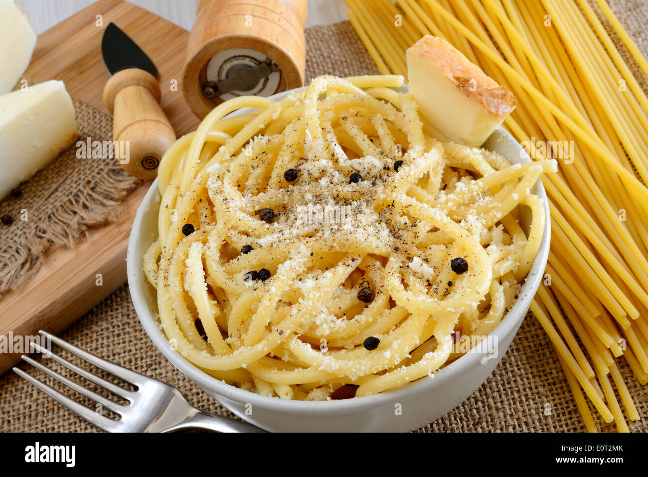 italian pasta bucatini with pecorino cheese and black pepper Stock