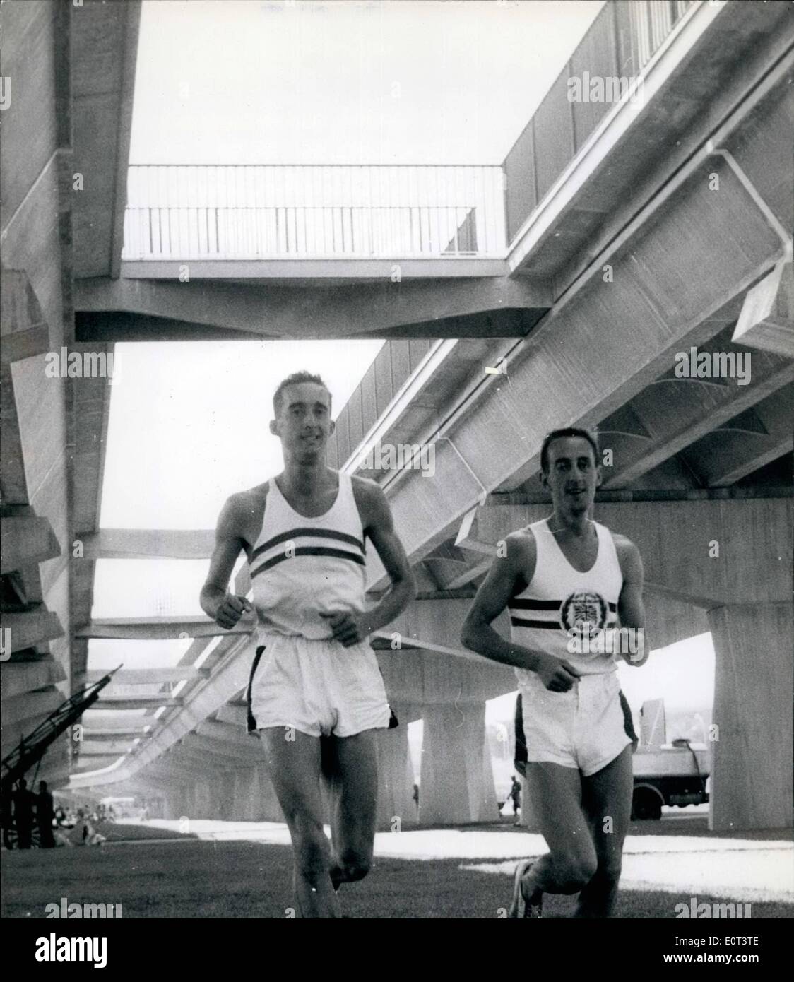 Sep. 09, 1960 - Two Lone Figures In Training Will Gordon Get The 10,000 Metres Medal; Britain's Gordon Pirie and his team mate Frank Salvat are to be seen early in morning training in the Olympic Village. Gordon is absolutely undaunted by his flop in teh 5,000 metres event - and is now concentrating on the 10,000 metres. Photo Shows - Gordon Pirie (left) and Frank Salvat in training in shadow of the Austrotade - for the final effort in the 10,000 meters. Stock Photo