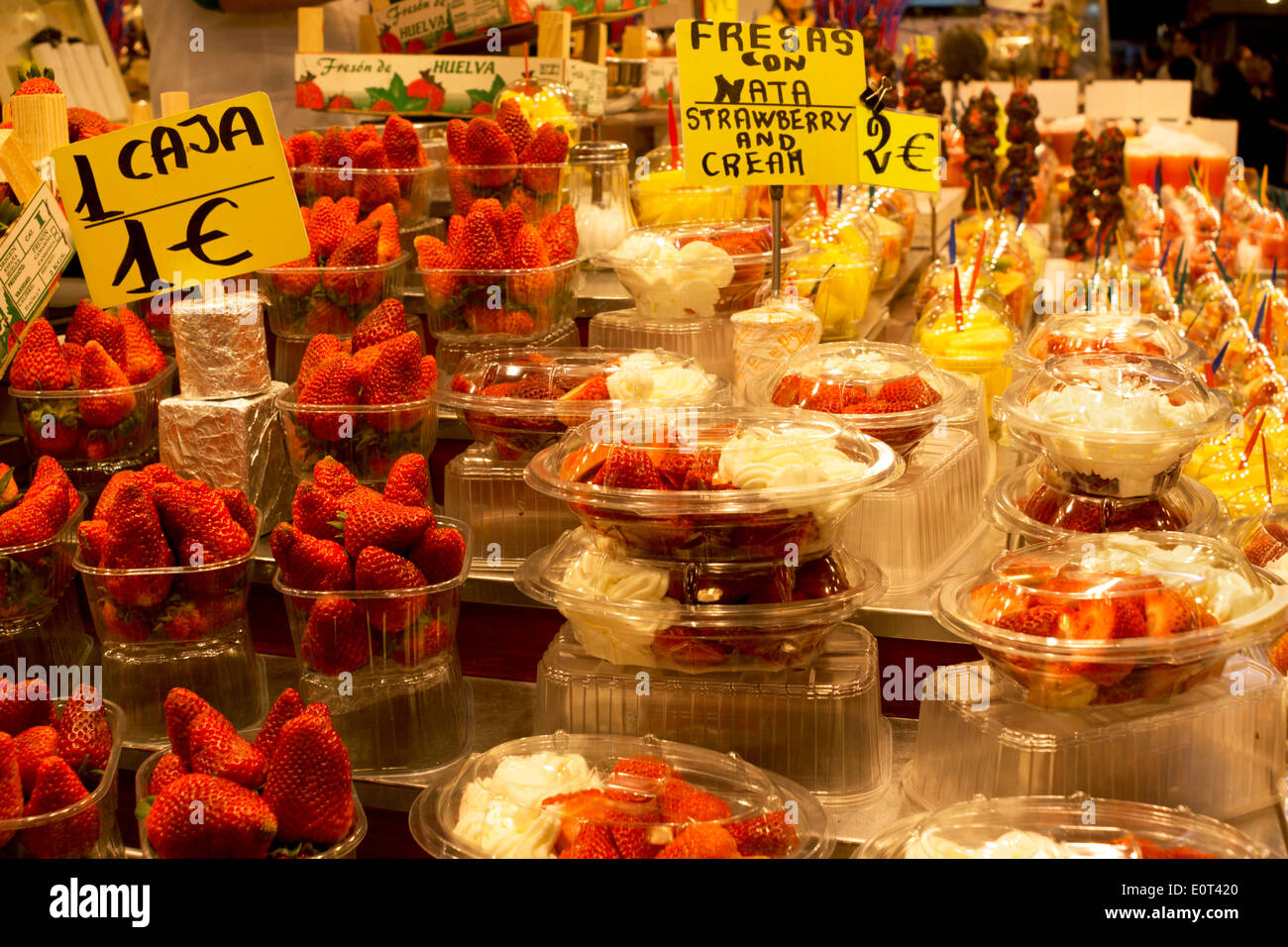 Strawberries and cream on sale in a market, Barcelona, Spain Stock