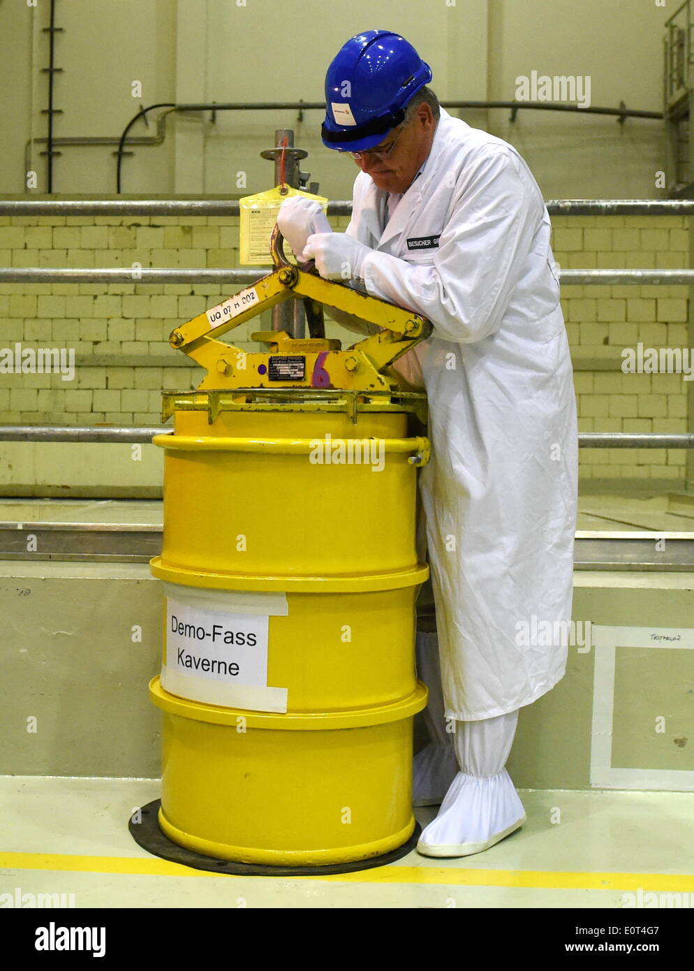 Plant manager Knut Frisch demonstrates a lifting mechanism for rusty