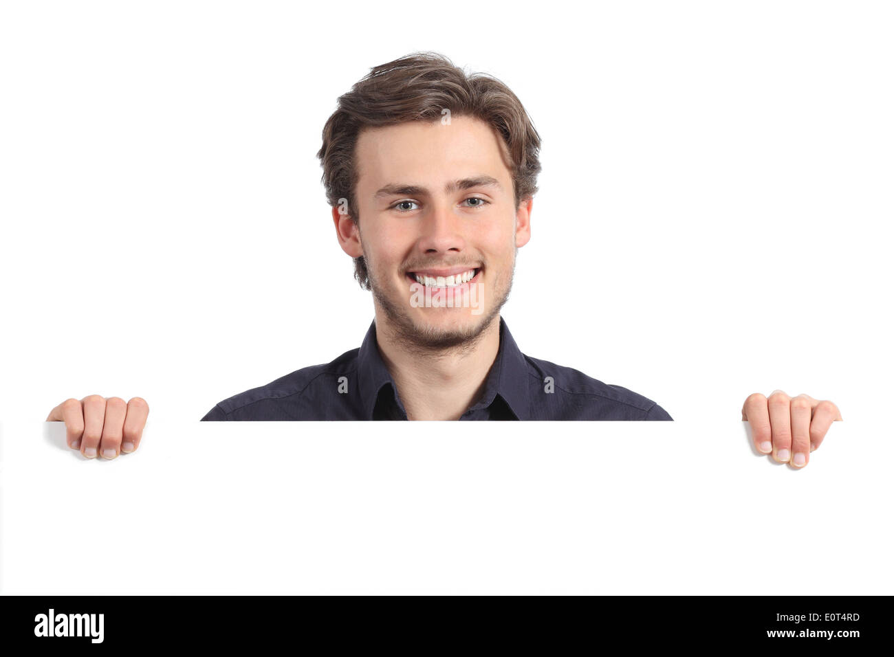 Happy man holding a blank banner isolated on a white background Stock Photo