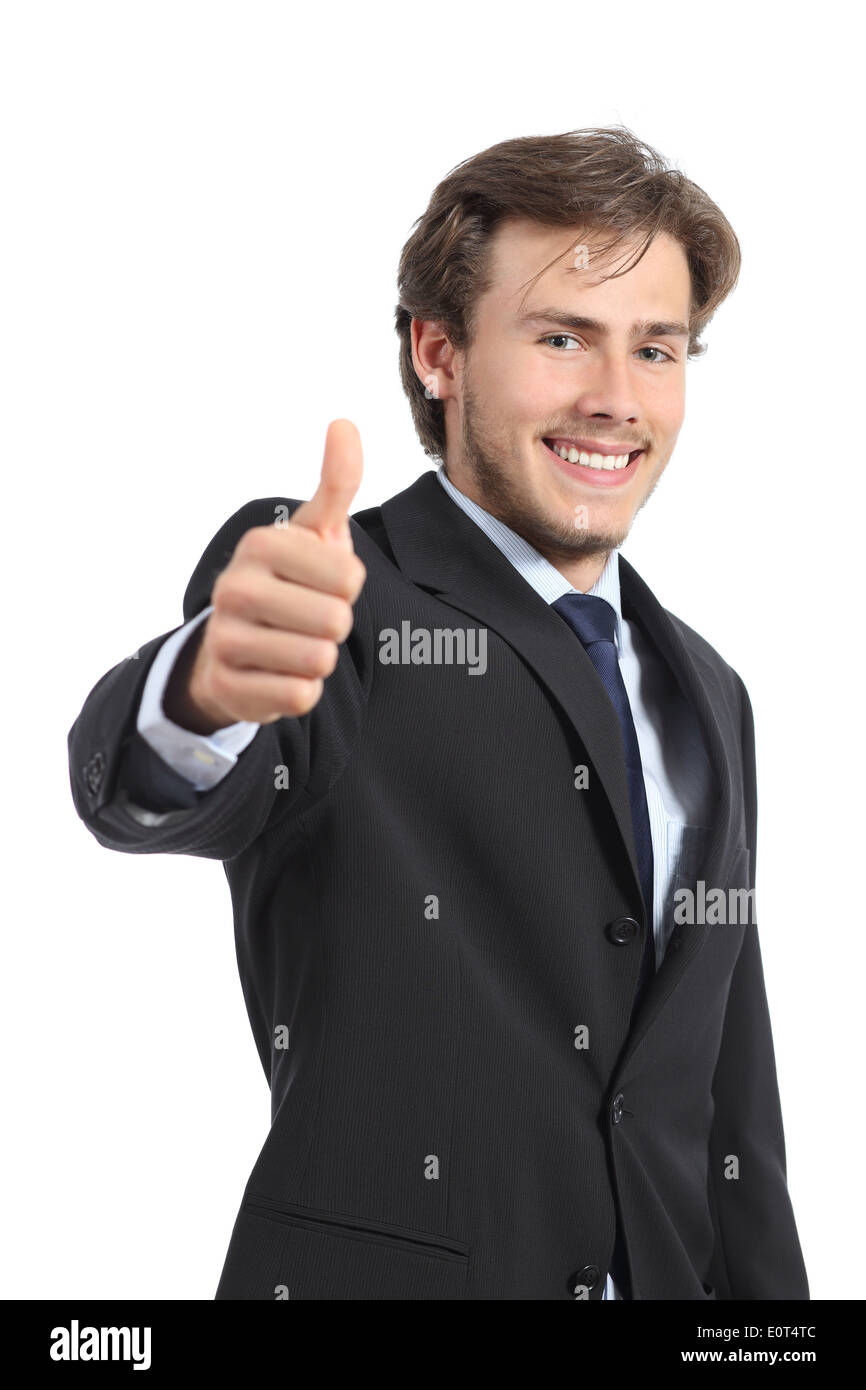 Young business man gesturing thumb up isolated on a white background Stock Photo