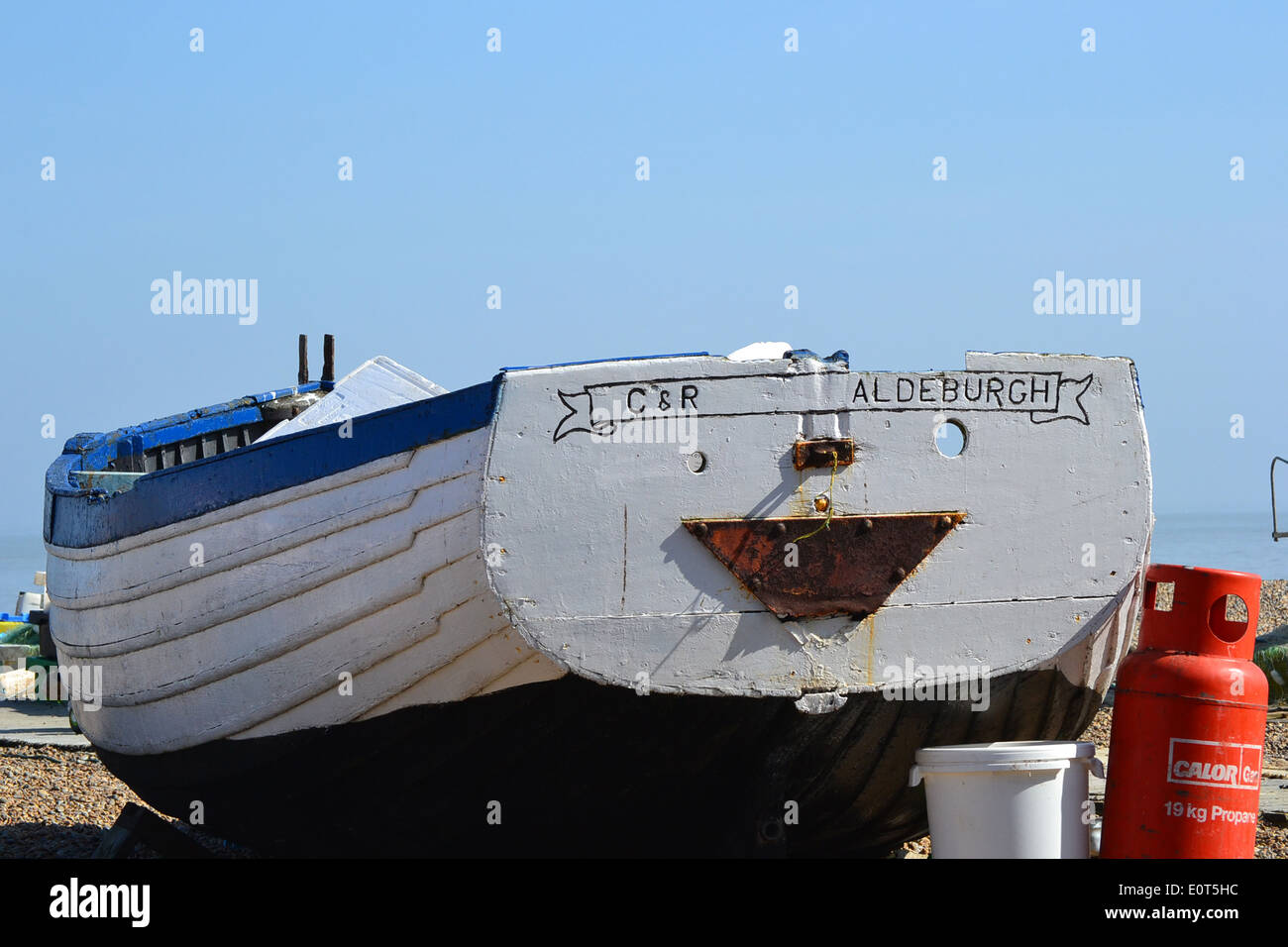 Traditional fishing boats on Aldeburgh Beach inspire artists, composers and visitors. This are permanently beached and historic boats. Stock Photo