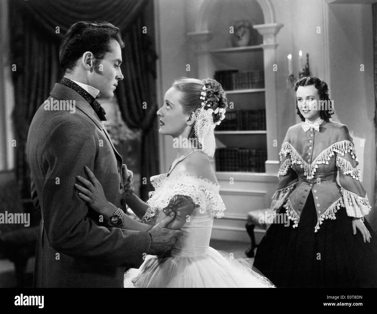 Henry Fonda, Bette Davis, & Margaret Lindsay, on-set of the Film, 'Jezebel', 1938 Stock Photo