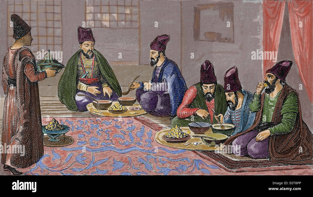 History. Persian meal. Engraving. (Later colouration). 19th century. Stock Photo