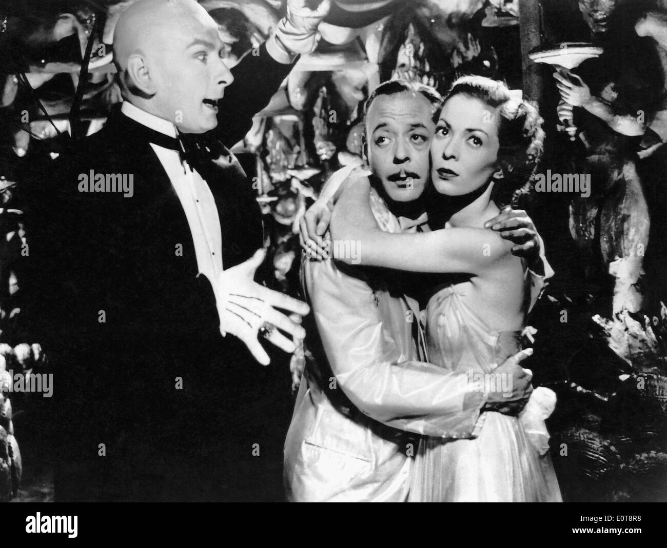 Arno Assmann, Bobby Todd, Bettina Moissi, on-set of the German Film, 'The Original Sin' (aka Der Apfel ist ab), 1948 Stock Photo