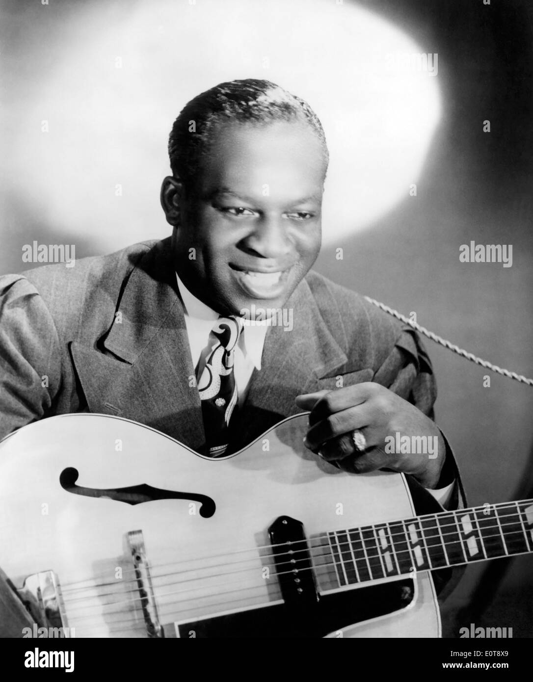 Jimmy Liggins, American R&B Guitarist and Bandleader, Portrait with Guitar, circa 1940's Stock Photo