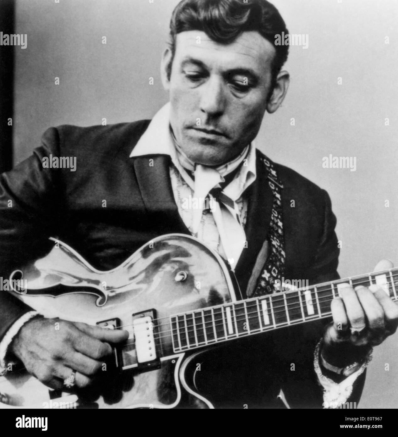 Carl Perkins Playing Guitar, circa Late 1960's Stock Photo