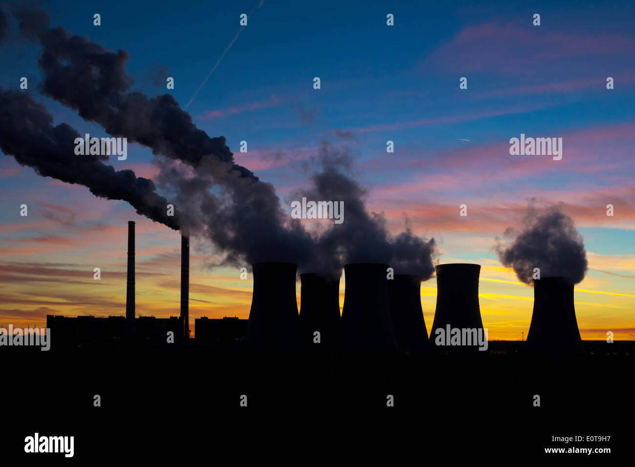 Power plant silhouette on evening sky Stock Photo