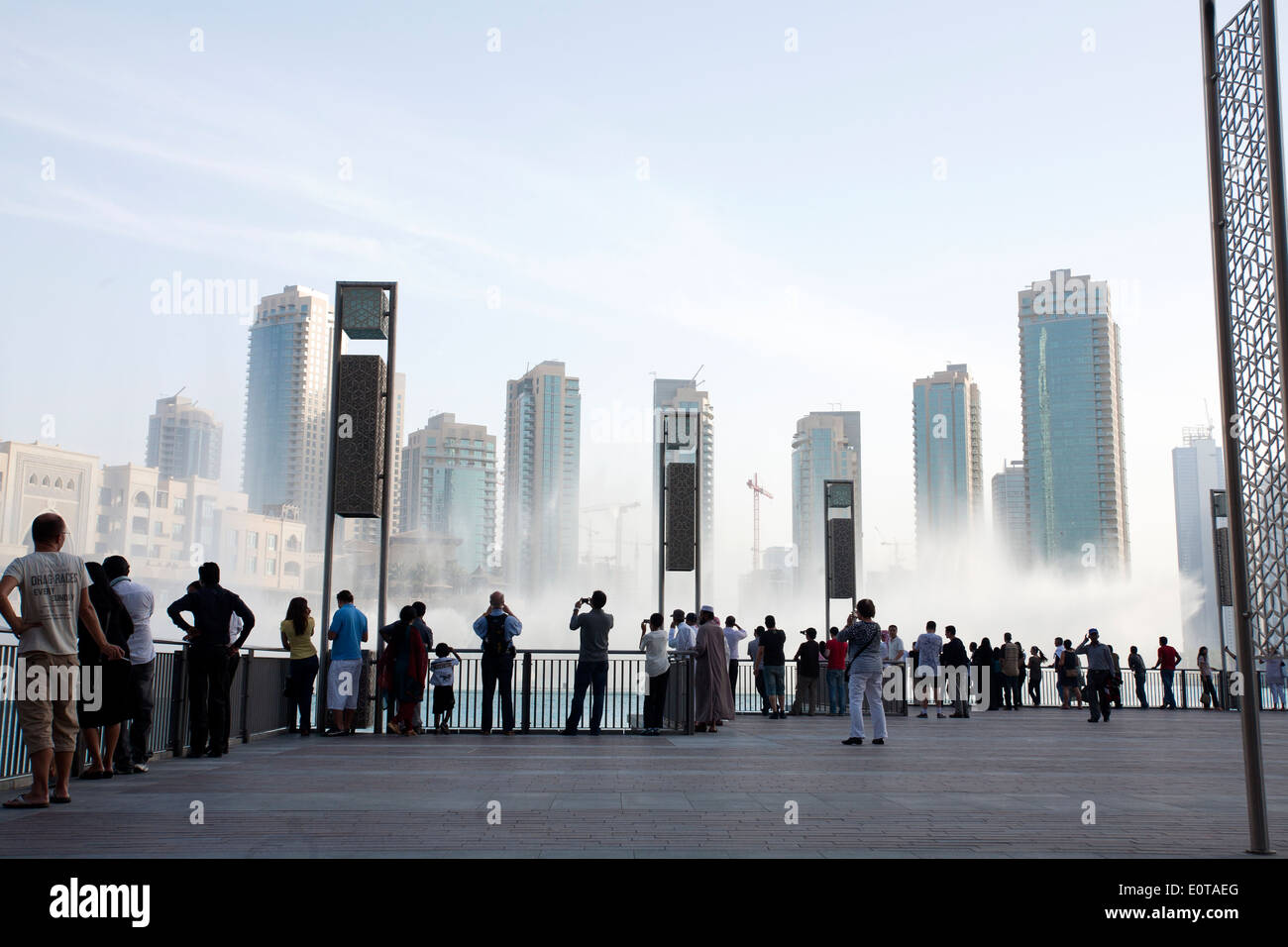 A crowd watching the dancing Dubai Fountain Stock Photo