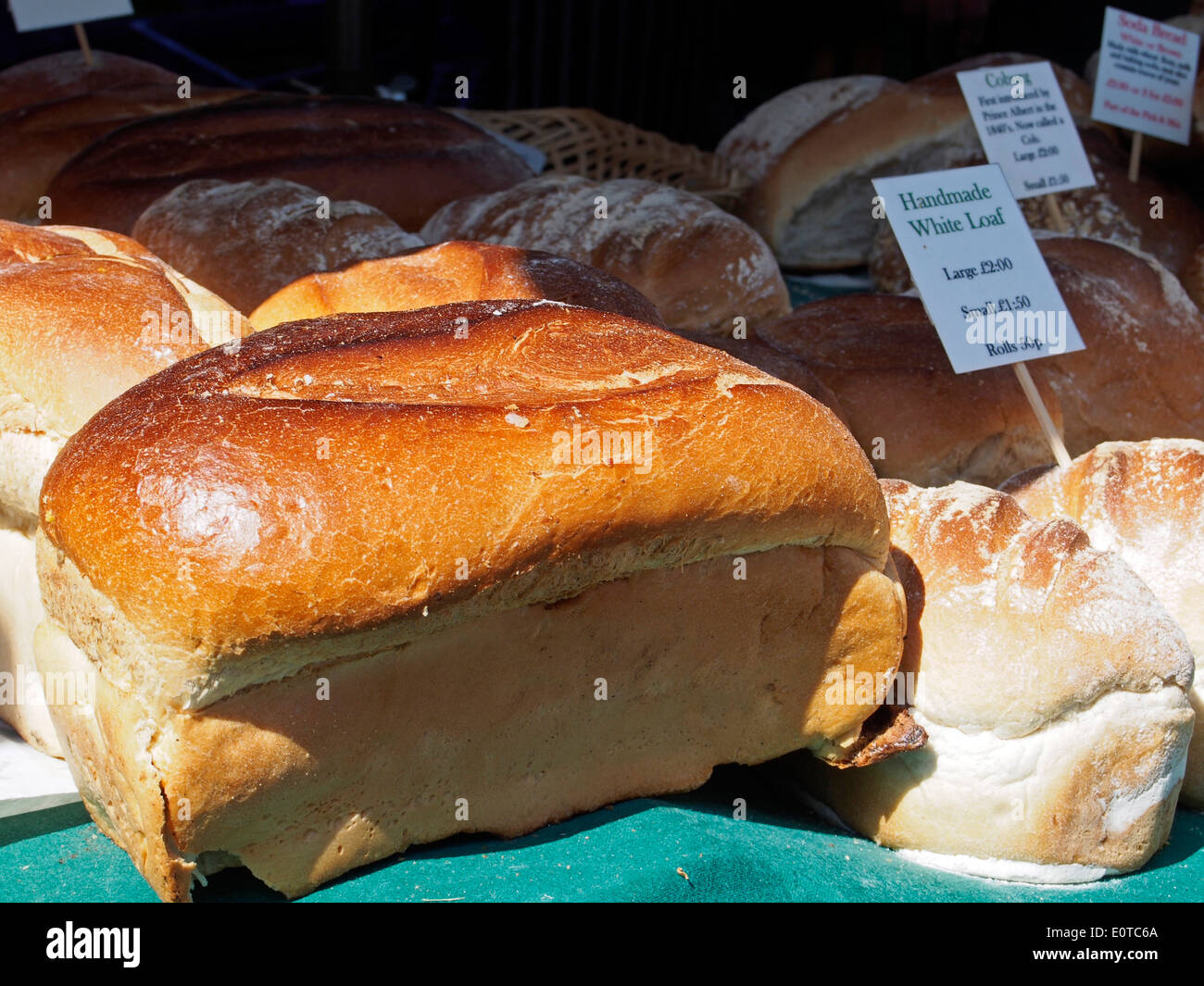 Artisan bread on stalls at a farmers market during Alresford Watercress Festival 2014. Stock Photo