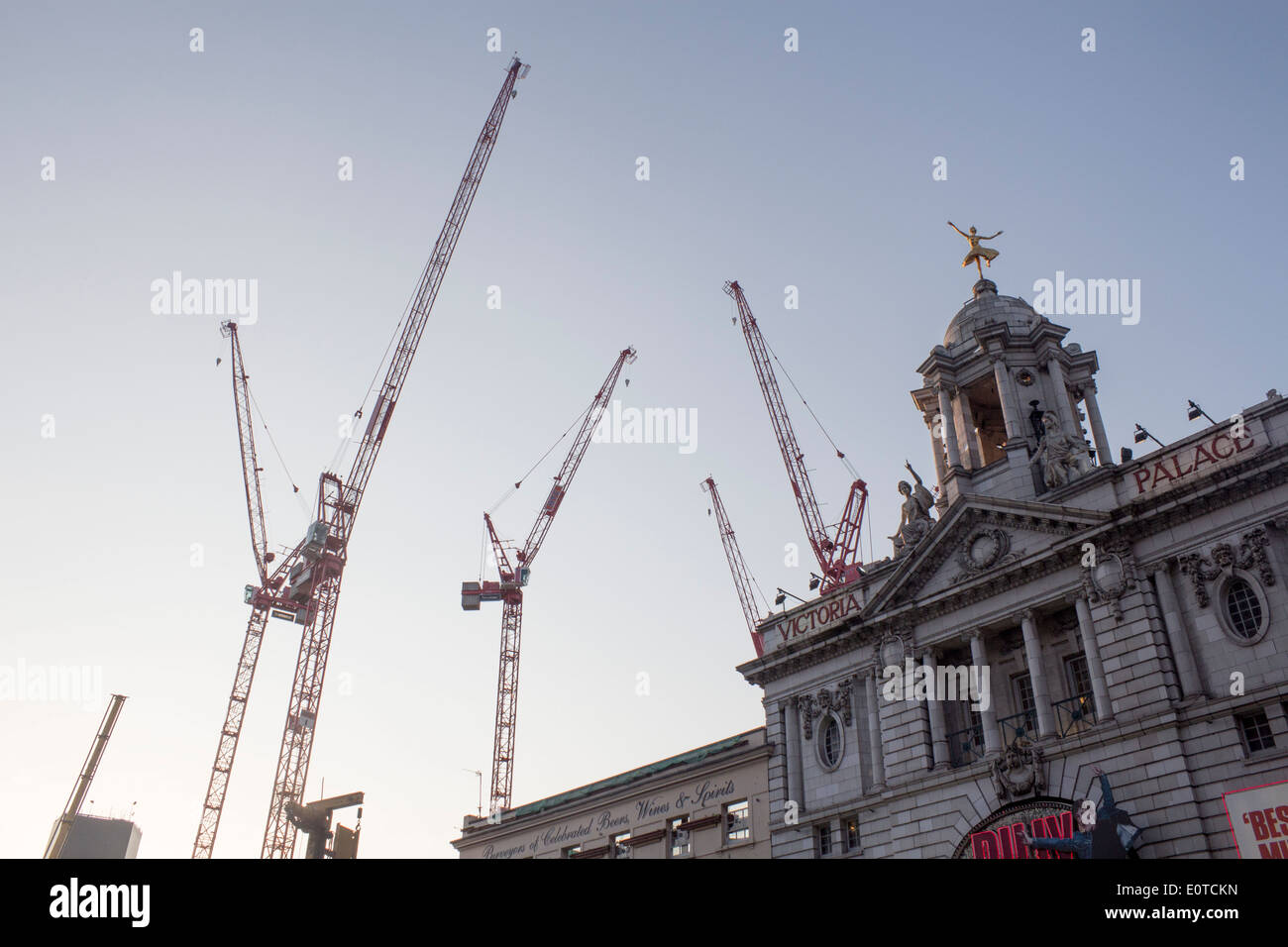 Cranes at construction site building site next to Victoria Palace Theatre central London England UK Stock Photo