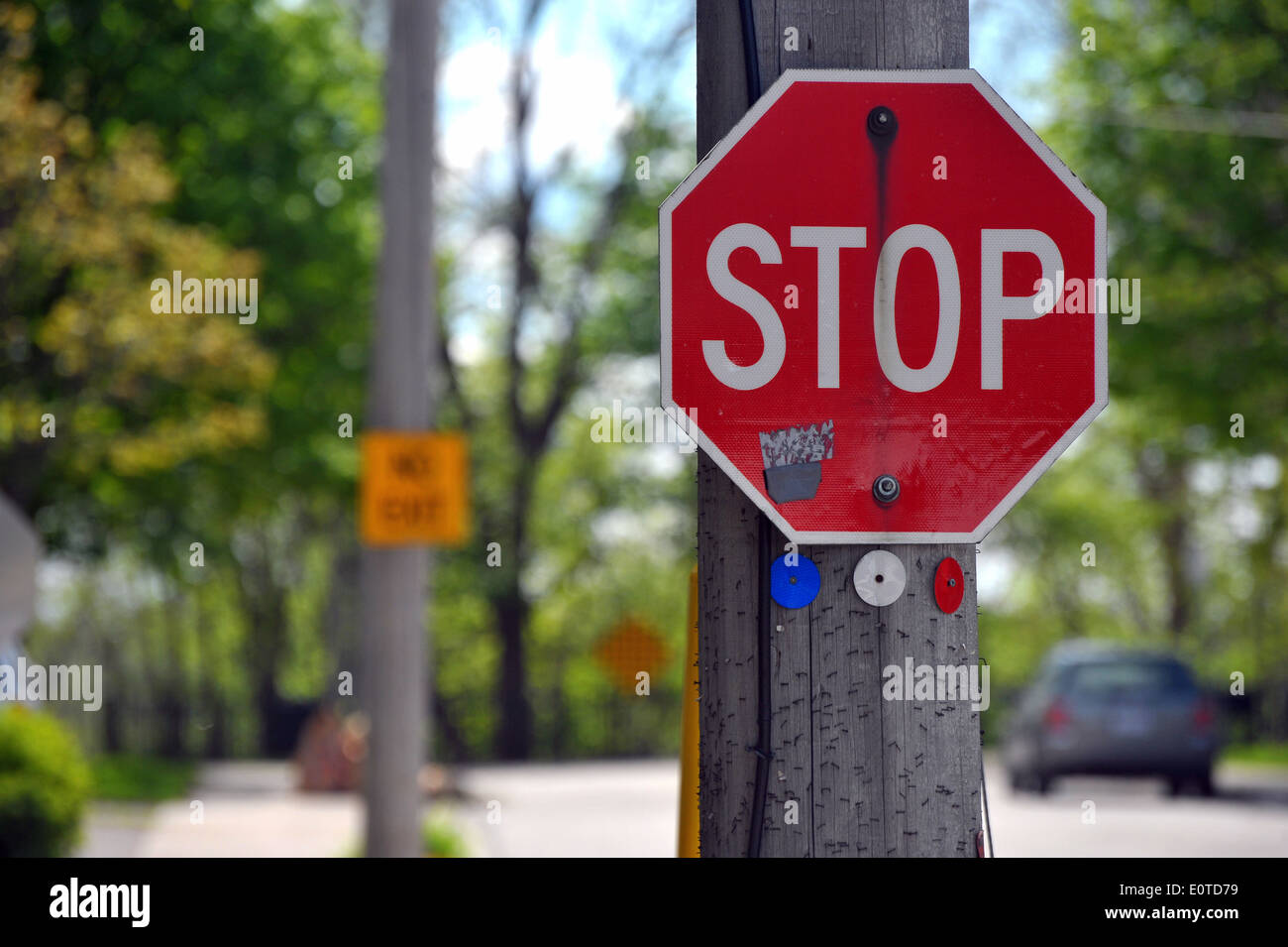 A stop sign on a Canadian street Stock Photo - Alamy