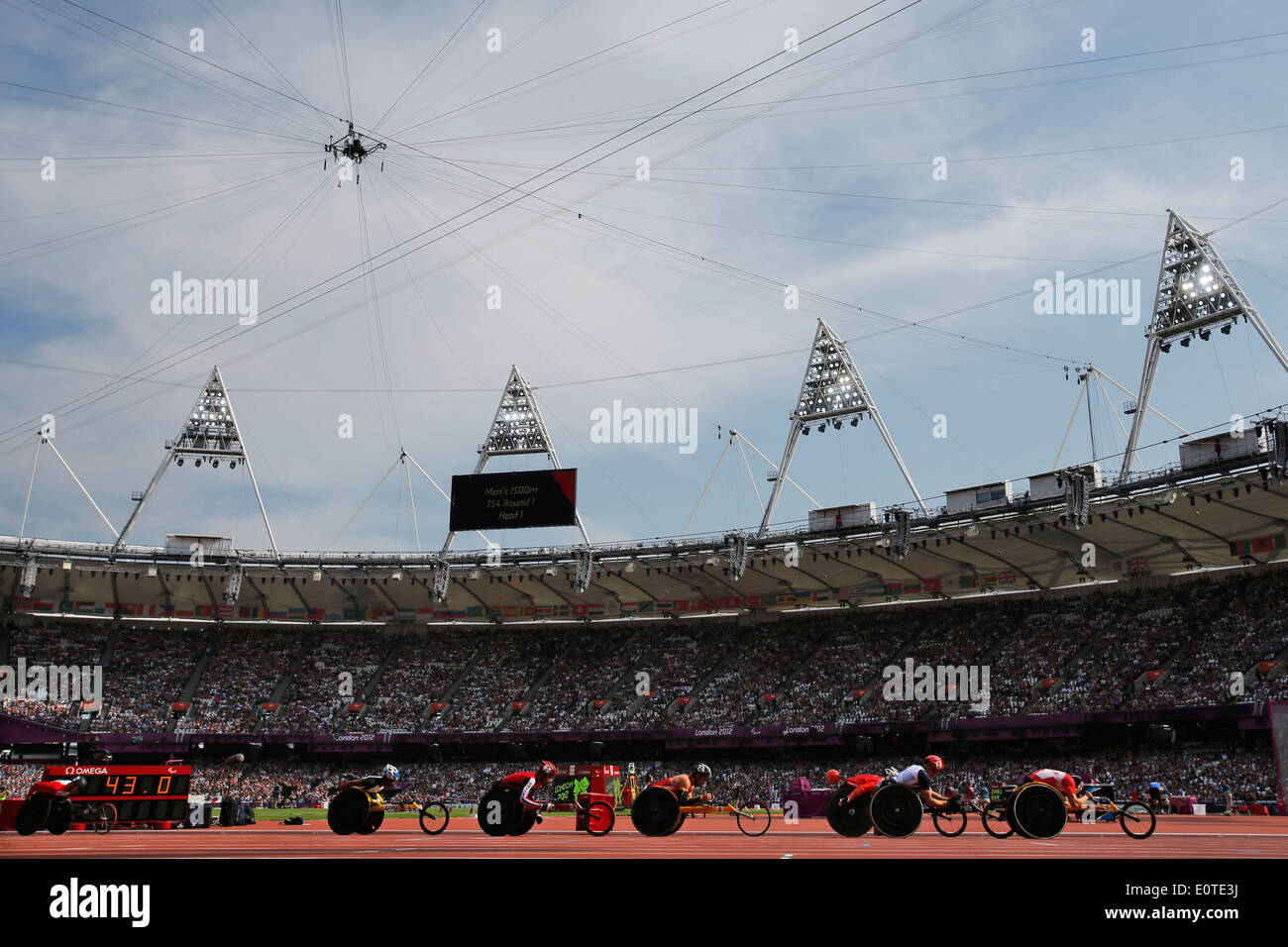 Athletes compete during the Men's 1500m - T54 round 1 at the Olympic Stadium during the London 2012 Paralympic Games, London, Britain, 03 September 2012. Stock Photo