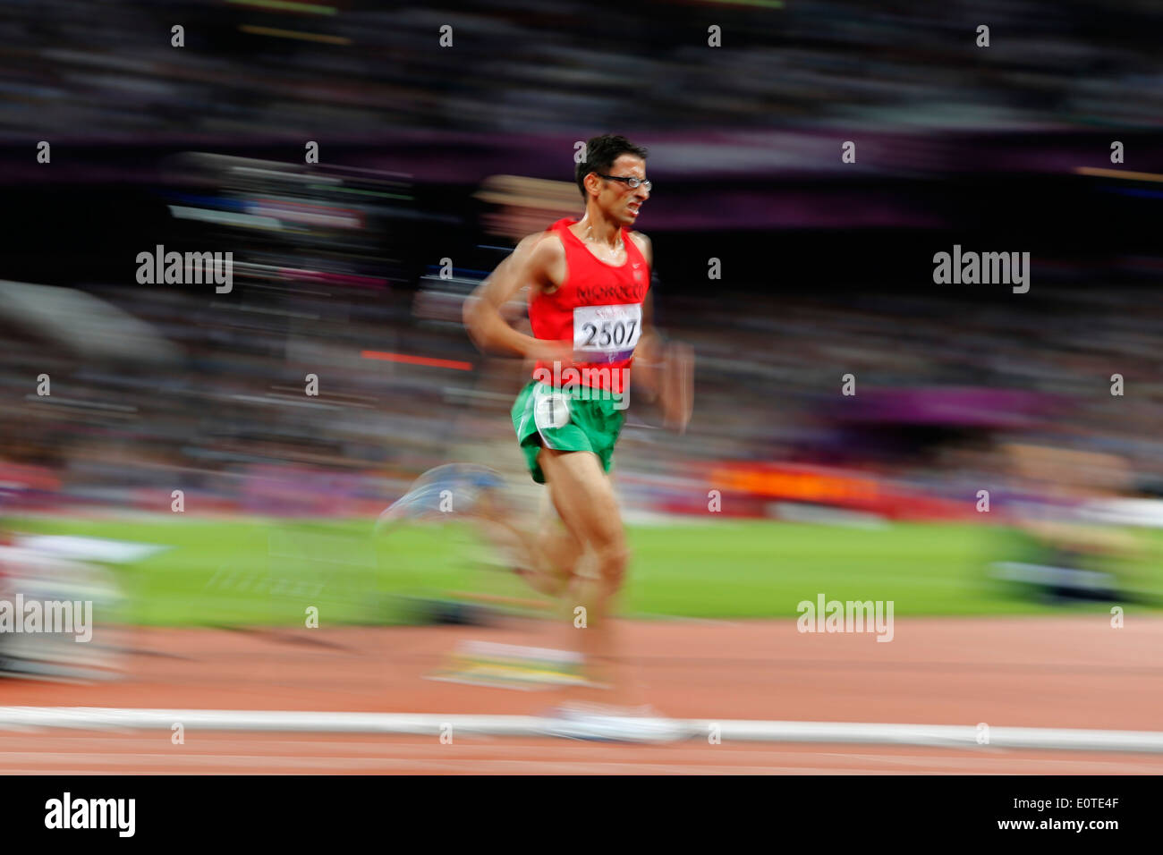 El Amin Chentouf of Morocco on his way to gold during the men's 5000m - T12 final at the Olympic Stadium during the London 2012 Paralympic Games, London, Britain, 03 September 2012. Stock Photo