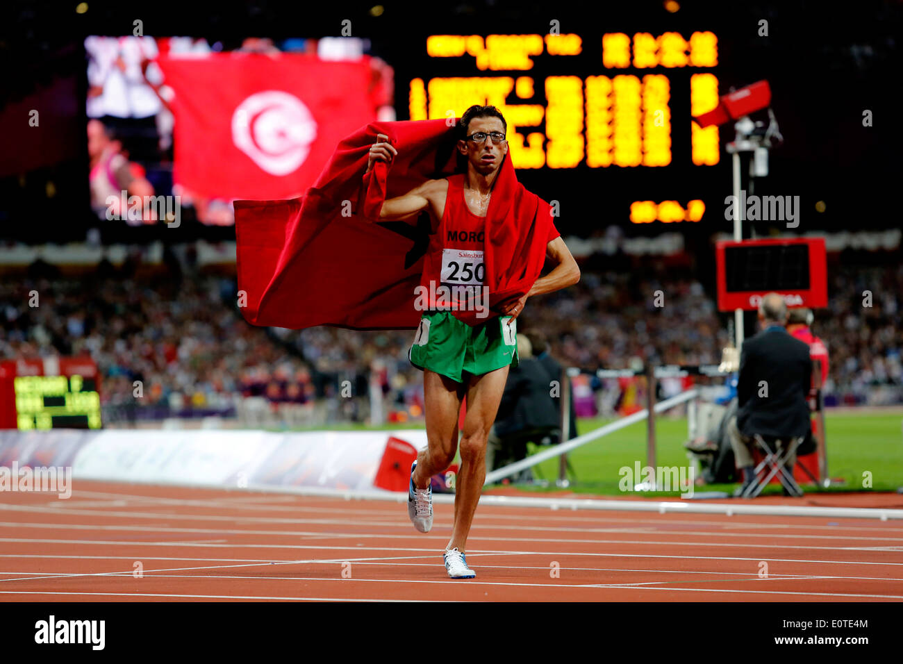 El Amin Chentouf of Morocco celebrates winning gold following the men's 5000m - T12 final at the Olympic Stadium during the London 2012 Paralympic Games, London, Britain, 03 September 2012. Stock Photo
