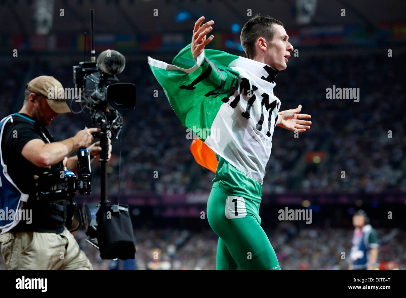 Michael McKillop of Ireland celebrates winning gold following the men's 1500m - T37 final at the Olympic Stadium during the London 2012 Paralympic Games, London, Britain, 03 September 2012. Stock Photo