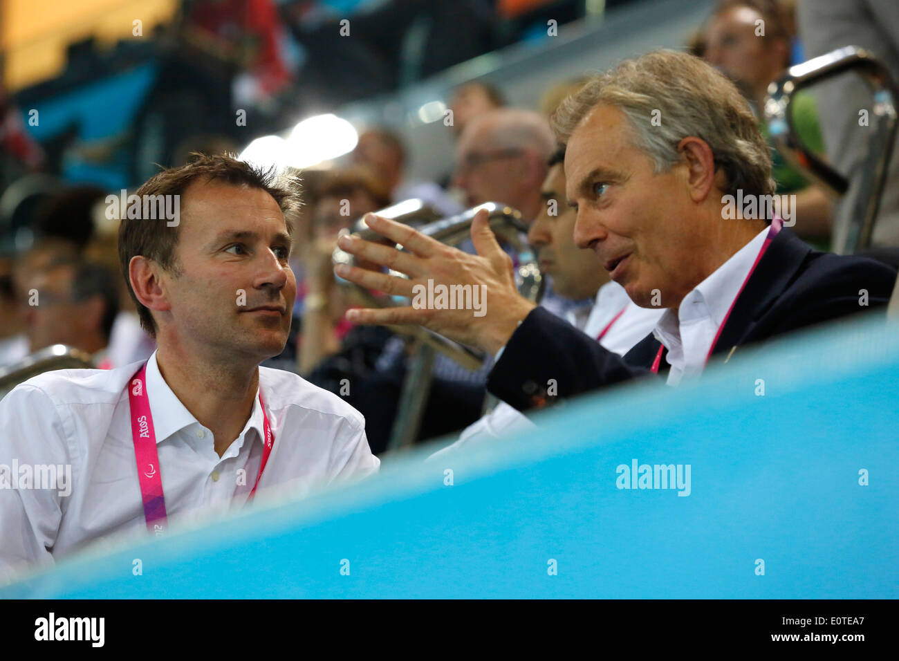 Britain's new Health Secretary Jeremy Hunt (L) and Former Prime Minister, Tony Blair (R) attend the swimming session competition held at the Aquatics Center during the London 2012 Paralympic Games in London, Britain, 07 September 2012. Stock Photo