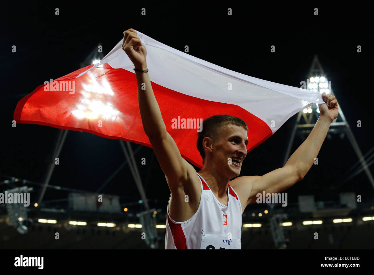 Maciej Lepiato of Poland celebrates winning gold following the men's High Jump - F46 final at the Olympic Stadium during the London 2012 Paralympic Games, London, Britain, 08 September 2012. Stock Photo