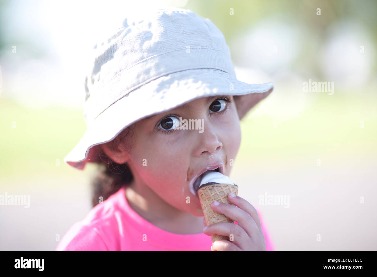 Girl eating Ice Cream Summer Time Stock Photo