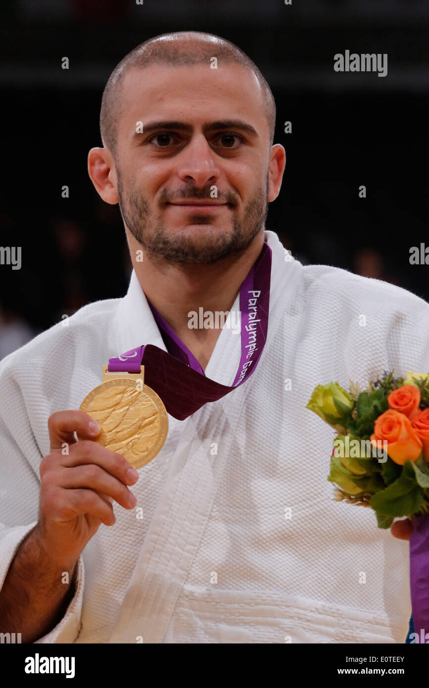 Davyd Khorava of Ukraine celebrates with his gold medal after he won the men's 66KG London 2012 Paralympic Games Judo competition in London, Britain, 30 August 2012. Stock Photo