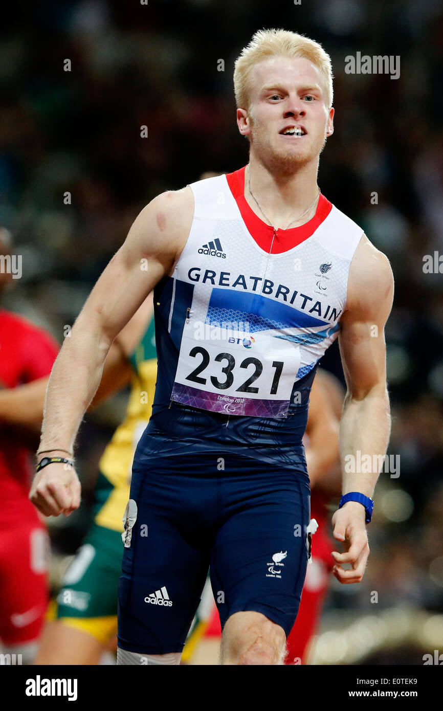 Jonnie Peacock of Great Britain on his way to win the gold during the men's 100m - T44 final at the Olympic Stadium during the London 2012 Paralympic Games, London, Britain, 06 September 2012. Stock Photo