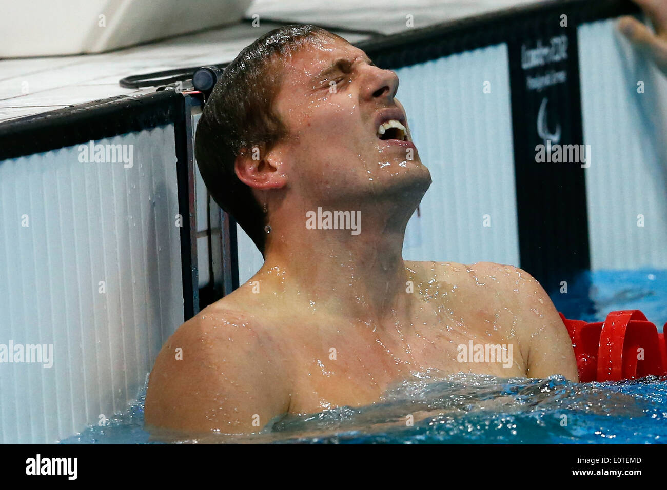 Matthew Cowdrey of Australia reacts after winning gold following the men's 100m Freestyle - S9 final swimming session competition held at the Aquatics Center during the London 2012 Paralympic Games in London, Britain, 07 September 2012. Stock Photo