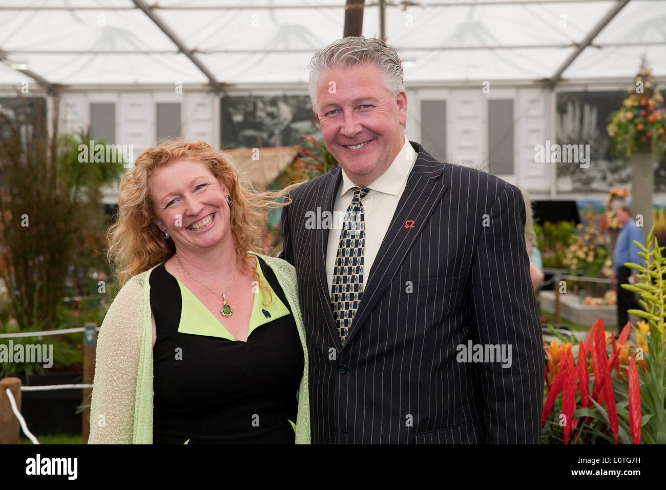 Chelsea, London, UK. 19th May 2014. Charlie Dimmock and Tommy Walsh pose in a marquee at the RHS Chelsea Flower Show 201 Credit: Keith Larby/Alamy Live News Stock Photo